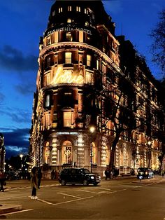 a very tall building lit up at night