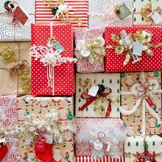 many presents are wrapped in red and white paper