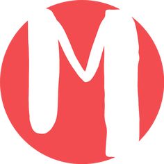 the letter m in a red circle with white letters on it's bottom half