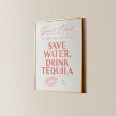 a pink poster with the words save water, drink tequila written in red on it