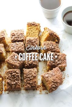 coffee cake cut into squares on top of a table