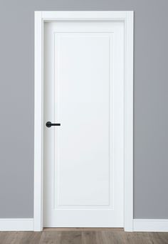 an open white door in a gray room