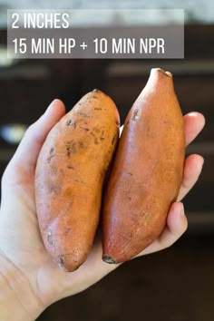 two sweet potatoes in the palm of someone's hand with text overlay that reads, 2 inches