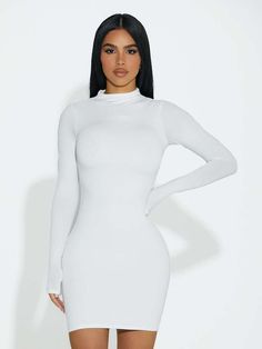 Fitted Dress | NW Figure It Out Dress | Naked Wardrobe Spring Turtleneck Mini Dress For Night Out, Spring Bodycon Mini Dress With Turtleneck, Trendy High Neck Mini Dress For Fall, Spring Turtleneck Bodycon Mini Dress, Solid Turtleneck Mini Dress For Spring, Spring Turtleneck Mini Dress, Spring Solid Color Turtleneck Mini Dress, High Stretch Long Sleeve Bodycon Winter Dress, Knee-length Stretch Bodycon Dress For Winter