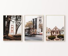 three framed photographs of san francisco with the golden gate bridge in the background