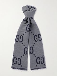 Gucci's scarf is jacquard-knitted with an oversized version of the 'GG' motif that was introduced in the '70s. It's been made in Italy from a warm wool and silk-blend and is quite wide. Scarf Gucci, Shop Gucci, Gucci Collection, Scarf For Men, Gucci Scarf, Gucci Logo, Scarf Men, Jacquard Knit, Gucci Accessories