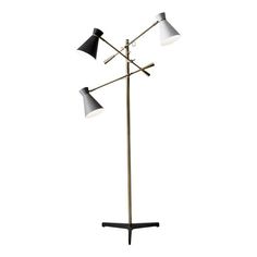 three light floor lamp with black and white shades on the top, two lamps on the bottom