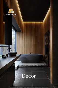 the bathroom is decorated in black and white with wood paneling on the walls, along with an oval bathtub