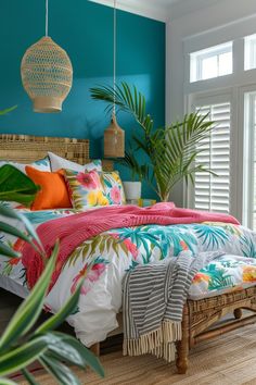 a bedroom with blue walls and colorful bedding in the center is decorated with palm leaves