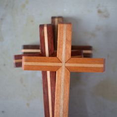 a wooden cross on top of a table