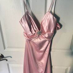 Light Pink Satin Material Prom Dress. The Back Is Very Strappy And Open. Never Worn Out, Just Been Sitting In My Closet For A Couple Years. No Tailoring Done. Comes With A Matching Sash Of The Same Material. Could Fit 0-2 Mauve Homecoming Dress, Mermaid Hoco Dresses, 2000 Hoco Dress, Aqua Homecoming Dresses, Pink 90s Prom Dress, Hoco Ideas Dresses, Pink Silk Dress Outfit, Hoco Dresses Satin, Hoco Pink Dress