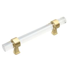 a white and gold toilet roll holder with two brass fittings on each end,