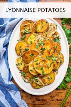 a white plate topped with sliced potatoes and parsley