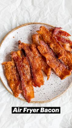 bacon strips on a white plate