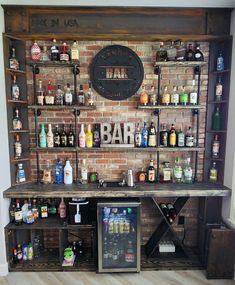 a bar with shelves and bottles on the wall