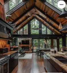 an open kitchen and dining area with wood flooring is featured in this postcard