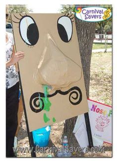 a cardboard box with a face painted on it