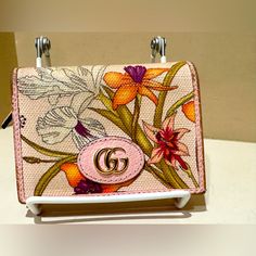 Gucci Compact Wallet Pink Canvas Floral Print Gold-Tone Hardware Grosgrain Lining & Dual Interior Pockets. Width: 3.5" Depth: 1' Height: 4.5" Has Signs Of Use Throughout, Please Look At Photos. Signs Of Wear On Outside Corners Such As Color Loss On Leather And Rubbing. Some Discoloration On Canvas. I Have Also Pictured The Serials And Made In. Thanks For Looking! Maxi Dress Designs, Gucci Bags, Gucci Gg Marmont, Gg Marmont, Small Wallet, Pink And Green, Gold Tones, Bag Lady, Floral Prints