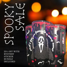 two halloween themed mugs with spooky skulls on them and the words scary