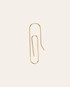 Modern and edgy 14k solid gold paper clip earring. It will be your new favorite ear accessory! Sold as a Single Size: Approx. 7mm(W) by 23mm(H) Total Weight: Approx. 0.5 grams Standard Production: 3-7 business days Rush Order Production: 2-5 business days Shipping: Select shipping method at checkout. Shipped from our L.A. Studio. This item is Final Sale. See here for details. Paper Clip Earring, Clip Earring, Gold Paper, Paper Clip, Clip On Earrings, Rush, Solid Gold, Unique Style, Jewelry Box