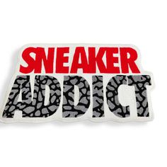 a patch with the words sneakr addict in red and black letters on white background