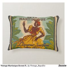 a pillow with an image of a woman wearing a yellow dress and holding her hand up in the air