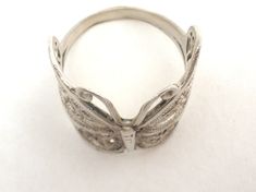 Vintage Jewelry - This is a wide sterling silver filigree butterfly ring. It is a size 8.5, measures slightly under 1" wide, hallmarked 925 and weighs 4.9 grams. Silver Filigree Butterfly Jewelry, Silver Butterfly Ring For Anniversary, Silver Butterfly Ring For Wedding, Silver Butterfly Filigree Jewelry, Silver Butterfly Ring For Formal Occasion, Silver Hallmarked Butterfly Ring, Hallmarked Silver Butterfly Ring, Silver Hallmarked Butterfly Ring For Wedding, Antique Silver Butterfly Jewelry