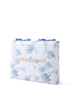 love shack fancy gift bag with blue flowers on it