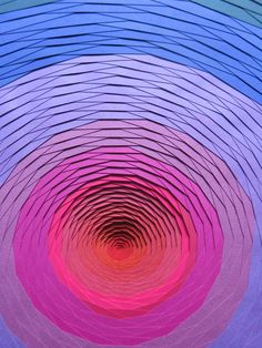 the inside of a circular structure with many colors