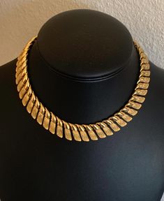 This bold shiny gold vintage tassel link necklace is 16 inches long with 5/8 inch wide shiny warm gold abstract links.  The necklace has a hook clasp.  The piece is well made from the 1940's sturdy and in great condition.  These are solid links so the necklace is heavy even though it is short.  16 inches is short for some of us.  BE SURE TO MEASURE YOUR NECK. These necklaces can be short for some people. Be sure to measure your neck.  I specialize in finding fun wearable vintage jewelry.  Please browse my shop for more options. Hook Clasp, Gold Texture, Link Necklace, Necklace Etsy, Tassels, Choker Necklace, Vintage Jewelry, Jewelry Necklaces, Accessory Gift