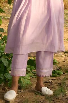 Lilac kurta with delicate pleats and placed flower embroidery. Comes with tiny scalloped embroidered hem pant. - Aza Fashions Elegant Resham Embroidered Bottoms For Spring, Elegant Resham Embroidery Bottoms For Spring, Elegant Bottoms With Resham Embroidery For Spring, Elegant Fitted Sets With Pintucks, Spring Wedding Pants With Resham Embroidery, Spring Wedding Pants With Floral Embroidery, Traditional Summer Wedding Pants, Traditional Summer Wedding Bottoms, Embroidered Hem