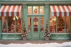 a store front decorated for christmas with candy canes and trees in the window display