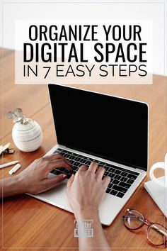 a person typing on a laptop with the text organize your digital space in 7 easy steps