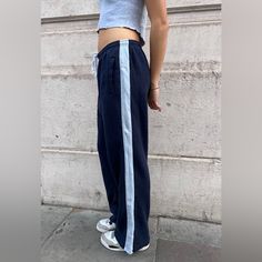 Thick And Cozy Cotton Sweatpants With An Elastic Waistband, Lace, Stripe Down The Side And Side Pockets. Fabrics: 87% Cotton, 13% Polyester Measurement: 11,5" (30 Cm) Rise, 29" (74 Cm) Inseam, 28" (70 Cm) Waist (Stretches) Made In: China Wide Leg Loungewear Bottoms With Side Stripes, Wide Leg Bottoms With Side Stripes For Loungewear, Wide Leg Sweatpants With Side Stripes For Loungewear, Relaxed Fit Wide Leg Bottoms With Side Stripes, Casual Wide Leg Sweatpants With Contrast Stripes, Wide Leg Loungewear Bottoms With Contrast Stripes, Wide Leg Bottoms With Contrast Stripes For Loungewear, Casual Wide Leg Pants With Contrast Stripes, Wide Leg Cotton Pants With Side Stripes