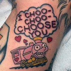 a man with a tattoo on his leg that says i ghoo - choo - choose you