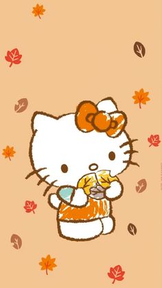 an image of hello kitty with autumn leaves