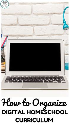 an open laptop computer sitting on top of a desk with the title how to organize digital homeschool curriculum