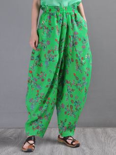 Style: Street Material: Ramie Pattern: Printed Length: Full Length Closure Type: Elastic Silhouette: Harem Gender: Female Season: Spring/Fall #pants #floral #ramie #harempants Baggy Harem Pants For Vacation, Baggy Floral Print Bottoms For Spring, Baggy Floral Print Pants For Summer, Baggy Summer Pants With Floral Print, Green Summer Harem Pants With Pockets, Spring Vacation Harem Pants With Relaxed Fit, Relaxed Fit Green Harem Pants, Green Bohemian Bottoms With Floral Print, Bohemian Green Floral Print Bottoms