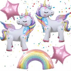 three unicorn balloons and one rainbow balloon with stars on the top, all in pastel colors