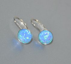 "Shop Leverback Earrings, Blue Opal Earrings Sterling Silver, Opal Jewelry Looking for opal jewelry? Opal is October birthstone. Shop Lever Back Earrings, Opal Earrings Sterling Silver, October Birthstone, 8mm Stone, Beaded Bridal Opal Jewelry. Opal earrings will bring a perfect touch of flair and splash of magnificent color to your outfit! Arrays of different colors are captured in beautiful opal cabochons. They look very mysterious. Lever back earrings are very light and comfortable. It will m Hypoallergenic Round Opal Jewelry, Opal Jewelry With Matching Earrings For Anniversary, Hypoallergenic Opal Dangle Earrings, Anniversary Opal Jewelry With Matching Earrings, Hypoallergenic Opal Dangle Jewelry, Opal Drop Earrings As A Gift, Hypoallergenic Opal Drop Earrings, Hypoallergenic Opal Earrings For Gift, Silver Dangle Opal Earrings