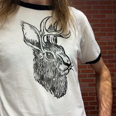 Handmade Jackelope Black And White Baseball Tee. These Are Printed By Hand In My Shop And Will Each Have Slight Variations. These Are Made With High Quality, Extra Soft Cotton Shirts, Not Cheap Gliden Concert Shirts. Vintage Feel And Look. White Hand Printed Crew Neck Top, White Hand Printed Short Sleeve Tops, Casual White Hand Printed T-shirt, Casual White Hand-printed Top, Casual Crew Neck Hand Printed T-shirt, Casual Hand Printed Crew Neck T-shirt, Spring Hand Printed Crew Neck Tops, Casual Hand Printed Tops For Spring, Shirts Vintage