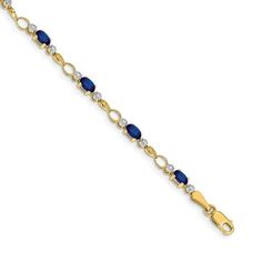 Flaunt this 14 karat yellow gold open link designed bracelet at any occasion for a complimenting style. The dazzling diamond accents and nine 2.70 cttw oval blue sapphire of 5x3mm each offers striking look to this 7-inch long bracelet. Lobster clasp ensures perfect security on your wrist. Metal Weight: 4.11 grams Jewelry Type: Fine Bracelet Style: Open Link Bracelet Jewelry Finish: High Polish Gender: Women's Clasp: Lobster Claw Metal: Gold Gold Karat: 14 Karat Metal Color: Yellow Plating: White Rhodium Dimensions: 7-inch x 4mm Gemstone Details: Type: Sapphire Color: Blue Shape: Oval Size: 5mm x 3mm Weight: 2.7 cttw Quantity: 9 Jewelry Setting: Prong Diamond Details: Clarity: I2 Color: I-J Shape: Round Size: 1.1mm Weight: 0.012 cttw Quantity: 2 Jewelry Setting: Prong Your item arrives in a Fine Bracelet, Long Bracelet, Bracelet Style, Sapphire Color, Sapphire Bracelet, Green Gifts, Bracelet Jewelry, Gold Gold, Bracelet Designs