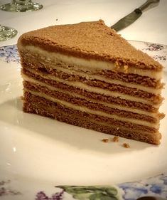 a piece of cake sitting on top of a white plate