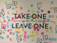 post - it notes on a wall with the words take one leave one