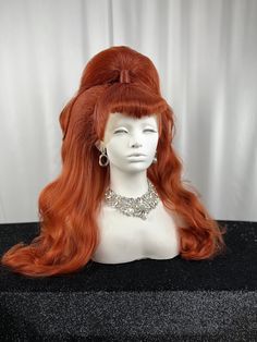 "This beautiful lace front synthetic wig will be custom styled, just for you! Images in this listing are an example of Top Pony with Bangs, 60s inspired hairstyle. Wigs featured in colors - Copper (\"V\" Bangs) and Platinum Blonde (Center Curled Bangs)  Prior to your custom styled wig shipping, I will send you multiple pictures to guarantee you are satisfied with the finished result.  Processing time is 4-6 weeks from placing order  Lace front wigs can fit a variety of head sizes, up to 23.5\" Due to the nature of this item, all sales are final. Please reach out if there is anything I can help with. All wigs are shipped securely in a 12\" x 12\" x 12\" box. I'm open to special orders and custom styles and colors. Please feel free to reach out with any questions." Pony With Bangs, Lsp Costume, Unique Wigs, 1960’s Hair, Dolly Parton Wigs, Hairstyle Wigs, V Bangs, Curled Bangs, Photography Reference