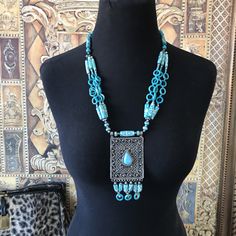 ON SALE Very pretty aqua beaded bohemian statement pendant necklace in excellent vintage condition. Measures 25 inches long and the pendant portion measures 4 1/2 inches long by 2 1/2 inches wide. Very pretty BoHo style jewelry piece. Blue Bohemian Beaded Necklace With Large Pendant, Bohemian Blue Beaded Necklace With Large Pendant, Bohemian Blue Beaded Necklaces With Large Pendant, Bohemian Blue Necklace With Large Pendant, Traditional Blue Turquoise Necklace With Large Pendant, Vintage Turquoise Beaded Necklaces, Vintage Turquoise Beaded Necklace, Vintage Blue Beaded Turquoise Necklace, Turquoise Bohemian Beaded Necklace With Large Pendant