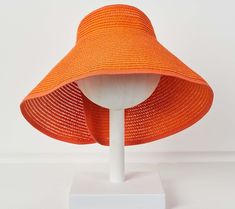 Embrace sunny days with the Poppy roll-up visor, a chic accessory designed to keep you cool and stylish. Perfect for brunch, beach outings, or outdoor weddings, its adjustable feature ensures a comfortable fit, while the charming back bow adds a trendy touch. From Violet and Brooks. Adjustable Packable Sun Hat For Sunbathing, Packable Hats For Spring Sunbathing, Packable Hats For Sunbathing In Spring, Packable Hats For Spring, Summer Sun Visor Hat With Upf 50+, Summer Sun Hat With Upf 50+ Visor, Summer Visor Sun Hat With Upf 50+, Adjustable Wide Brim Sun Hat For Poolside, Lightweight Adjustable Sun Hat For Poolside