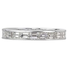 Handcrafted in 18k white gold, this elegant diamond eternity band features 2.10ct of baguette cut diamonds graded at E-F, VS1-VS2. All eternity bands are shown in a size 6.5. We custom craft each eternity band and will create the same design for you in your desired ring size. Please contact us with any questions. Thank you. Luxury Baguette Cut White Eternity Band, Luxury Platinum Eternity Band With Baguette Cut, Baguette Cut Eternity Band With Diamond Accents, Memory Ring, Mark Broumand, Diamond Eternity Band, Baguette Cut Diamond, Eternity Band Diamond, Diamond Eternity