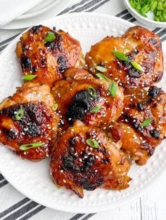 chicken wings with sesame seeds on a white plate