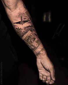 a man's arm with an airplane and money tattoo on the left hand,